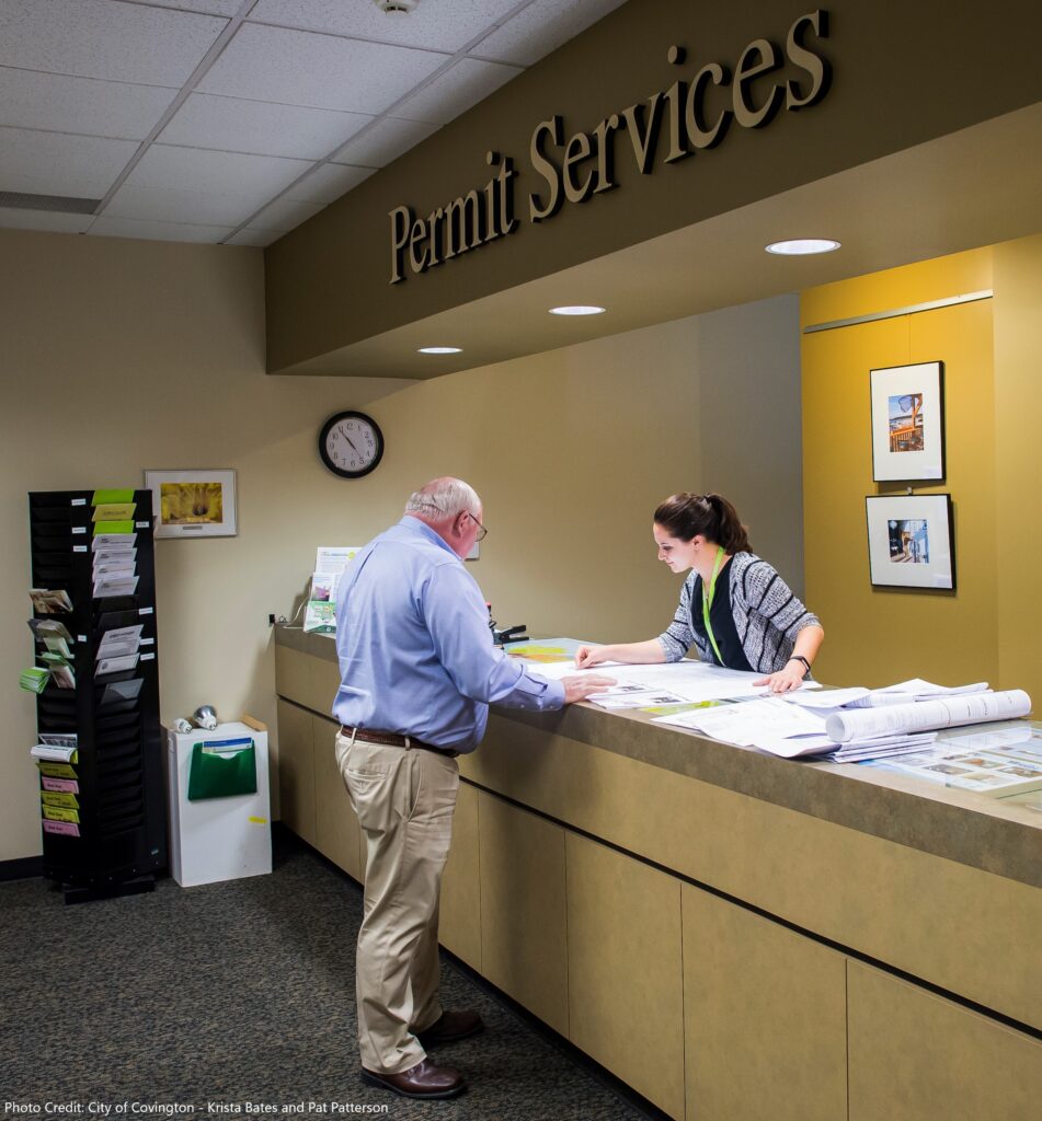 Customer at a Permit Services counter. Photo credit: City of Covington - Krista Bates and Pat Patterson.
